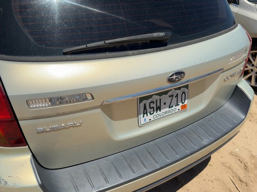 05-09 Legacy Outback License Plate Trim Surround Panel Tail Trunk Finish Gold 9J