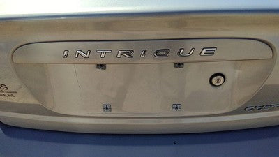 2000 Oldsmobile Intrigue License Plate Trim Surround Panel Tail Trunk Silver 17U