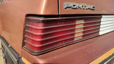1985-1987 Pontiac Sunbird Driver Left Tail Light Brake Lamp Oem Rear Crack