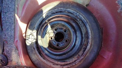 1988-1994 Grand Prix Compact Spare Donut Wheel And Tire Oem 09591237