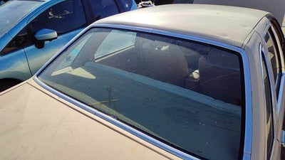 1984 Ford Tempo Chrome Moulding Around Back Glass Oem