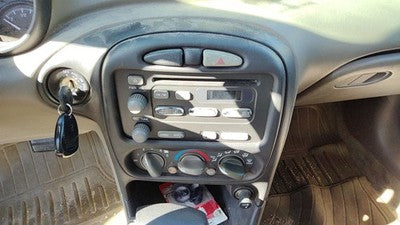 2004 Pontiac Grand Am Trim Bezel Around Radio Surround Dash Panel Oem
