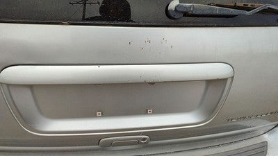 2000 Chrysler Town & Country License Plate Trim Surround Panel Tail Trunk Finish