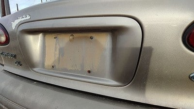 95-99 Contour License Plate Trim Surround Panel Tail Trunk Finish Dk Champagne