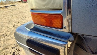 80-84 Deville Sedan Driver Left Below Headlamp Bumper Filler Front Blue Moulding
