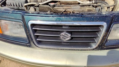1996-1997 Suzuki Sidekick Front Grille Oem Chrome 7211177E00d2w