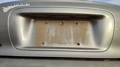 95-99 Contour License Plate Trim Surround Panel Tail Trunk Finish Dk Champagne
