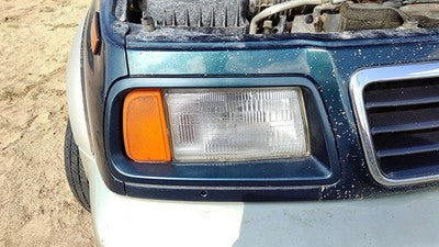 96-97 Suzuki Sidekick Passenger Right Headlight Trim Surround Panel Green Sort