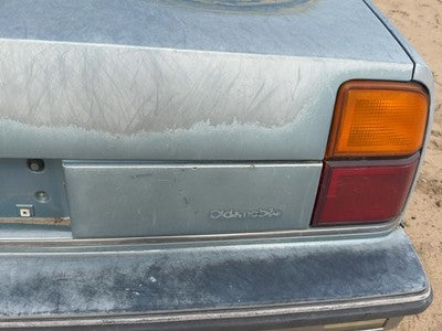 1986-1987 Olds 88 License Plate Trim Surround Panel Oem Tail Trunk Finish Blue