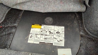 1989 Olds Cutlass Calais Spare Tire Cover Plastic Shield Oem