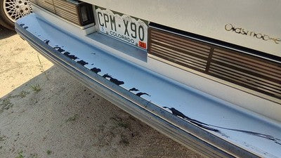 1990-1991 Olds 88 Silver Trim Strip Between Tail Lights And Bumper Oem Panel