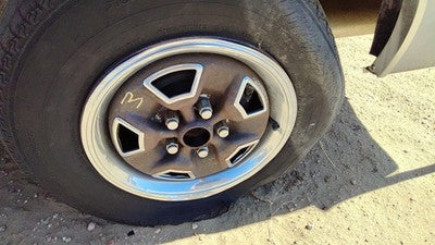 82-86 Firenza 13" Steel Wheel With Chrome Trim Factory Rim Super Stock