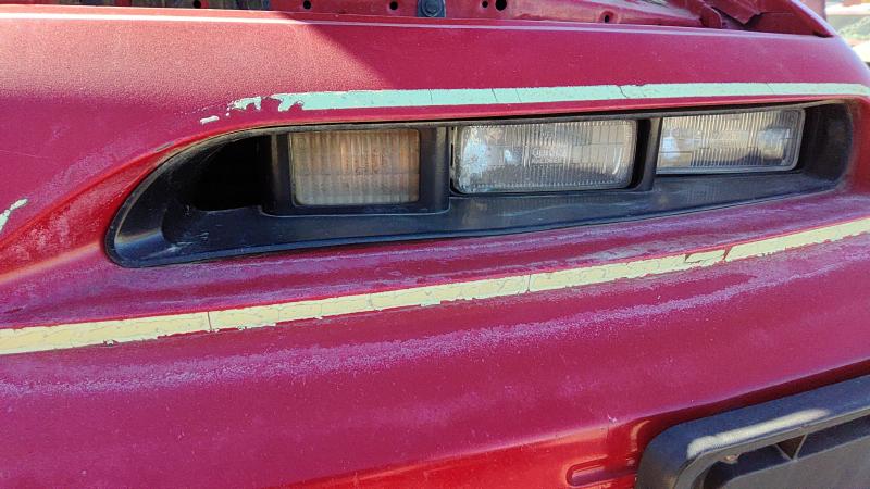 1991-1996 Grand Prix Headlight Door LH