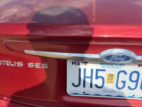 00-03 Ford Taurus License Plate Trim Surround Panel Oem Tail Trunk Finish Red