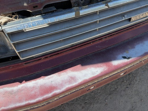 1987-1988 Nissan Maxima Trim Strip Below Front Grille Assembly Oem Gxe Red
