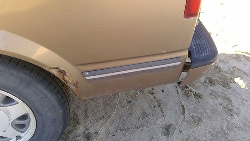 1995-2005 Chevy Astro Driver Left Rear Moulding On Quarter Panel Oem Brown