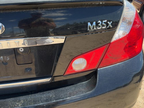 06-07 M35X License Plate Trim Surround Panel Tail Trunk Finish Camera Black Obsi