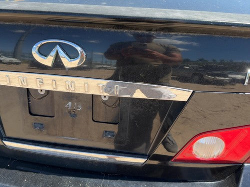 06-07 M35X License Plate Trim Surround Panel Tail Trunk Finish Camera Black Obsi