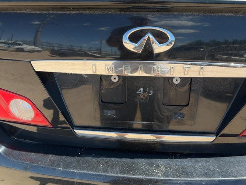 06-07 M35X License Plate Trim Surround Panel Tail Trunk Finish Camera Black Obsi