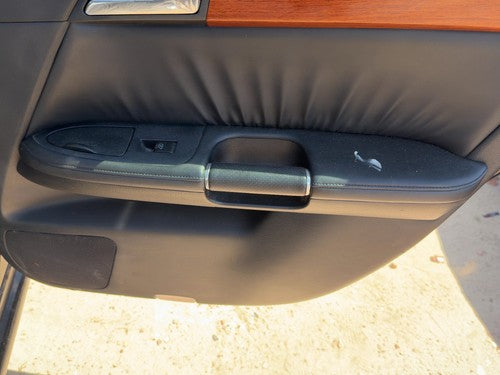 06-07 M35X Passenger Right Rear Door Trim Panel With Switches Back Wood Graphite