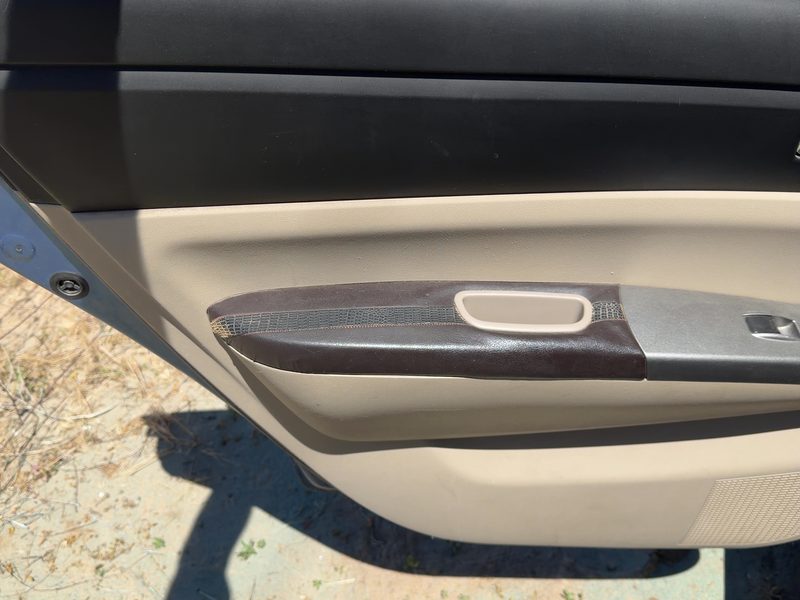 2004-2005 Toyota Prius Rear Door Trim Panel LH