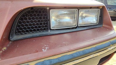 1985-1987 Pontiac Sunbird Driver Left Headlight Trim Bezel Oem Surround Door