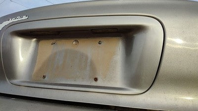95-99 Contour License Plate Trim Surround Panel Tail Trunk Finish Dk Champagne