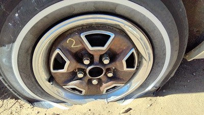 82-86 Firenza 13" Steel Wheel With Chrome Trim Factory Rim Super Stock