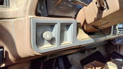 1985-1988 Pontiac Sunbird Lower Dash Under Column Knee Bolster Trim Panel Tan