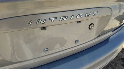 2000 Oldsmobile Intrigue License Plate Trim Surround Panel Tail Trunk Silver 17U