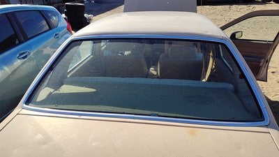 1984 Ford Tempo Chrome Moulding Around Back Glass Oem