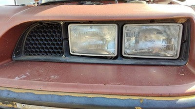 1985-1987 Pontiac Sunbird Driver Left Headlight Trim Bezel Oem Surround Door