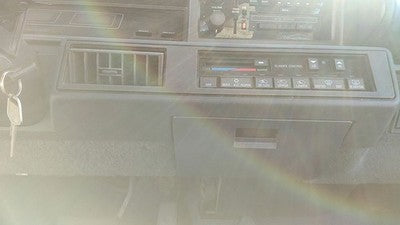 1988-1992 Olds Cutlass Cierra Trim Bezel Around Radio Surround Dash Panel Oem