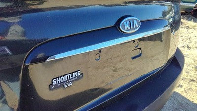 05 Kia Spectra License Plate Trim Surround Panel Tail Trunk Finish Black 4 Door