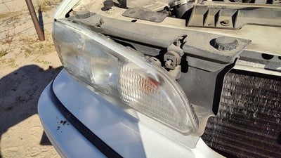 1992-1995 Pontiac Bonneville Passenger Right Head Light Front Lamp Mount Damage