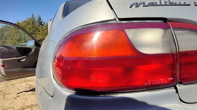 1997-2005 Chevy Malibu Driver Left Tail Light Brake Lamp Oem Rear Crack 15894727