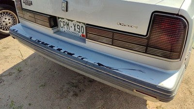 1990-1991 Olds 88 Silver Trim Strip Between Tail Lights And Bumper Oem Panel