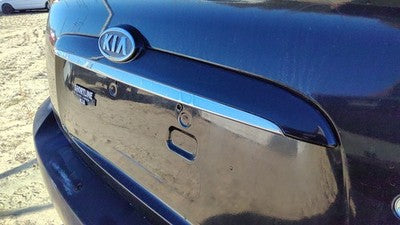 05 Kia Spectra License Plate Trim Surround Panel Tail Trunk Finish Black 4 Door