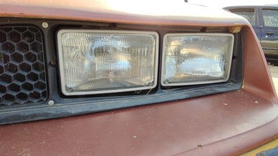 1985-1988 Pontiac Sunbird Driver Left Head Light Oem Front Lamp 10026819