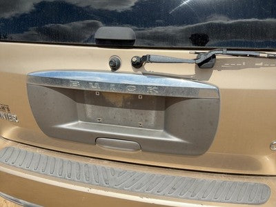 04-05 Rainier License Plate Trim Surround Panel Tail Trunk Finish Cashmere 15U
