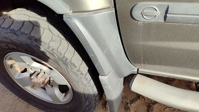 2000-2004 Nissan Xterra Driver Left Front Wheel Lower Flare Moulding Oem Fender