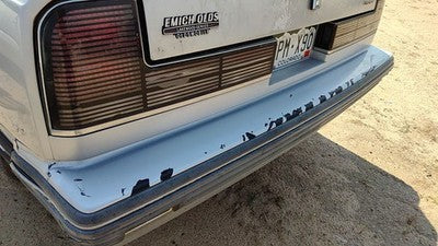 1990-1991 Olds 88 Silver Trim Strip Between Tail Lights And Bumper Oem Panel