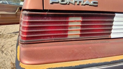 1985-1987 Pontiac Sunbird Driver Left Tail Light Brake Lamp Oem Rear Crack