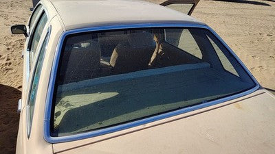 1984 Ford Tempo Chrome Moulding Around Back Glass Oem