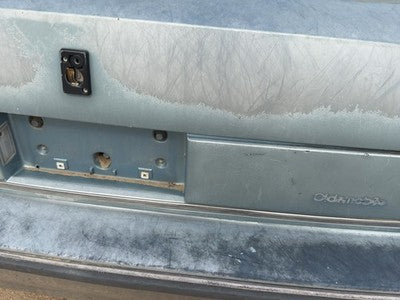1986-1987 Olds 88 License Plate Trim Surround Panel Oem Tail Trunk Finish Blue