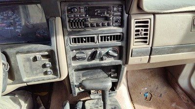 1994-1995 Jeep Grand Cherokee Trim Bezel Around Radio Surround Dash Panel Gray