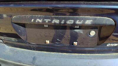 00 Oldsmobile Intrigue License Plate Trim Surround Panel Oem Tail Trunk Blue 28u