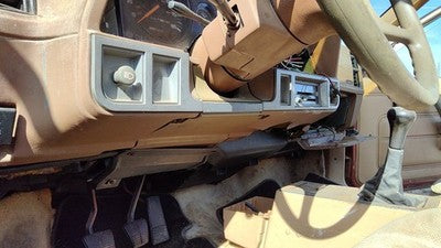 1985-1988 Pontiac Sunbird Lower Dash Under Column Knee Bolster Trim Panel Tan