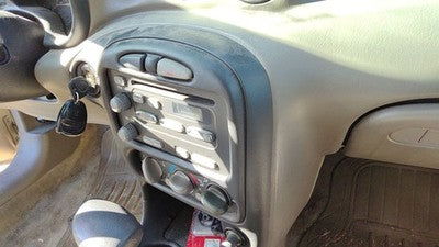 2004 Pontiac Grand Am Trim Bezel Around Radio Surround Dash Panel Oem