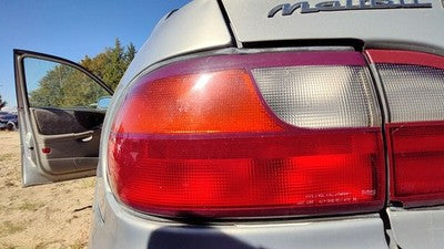1997-2005 Chevy Malibu Driver Left Tail Light Brake Lamp Oem Rear Crack 15894727